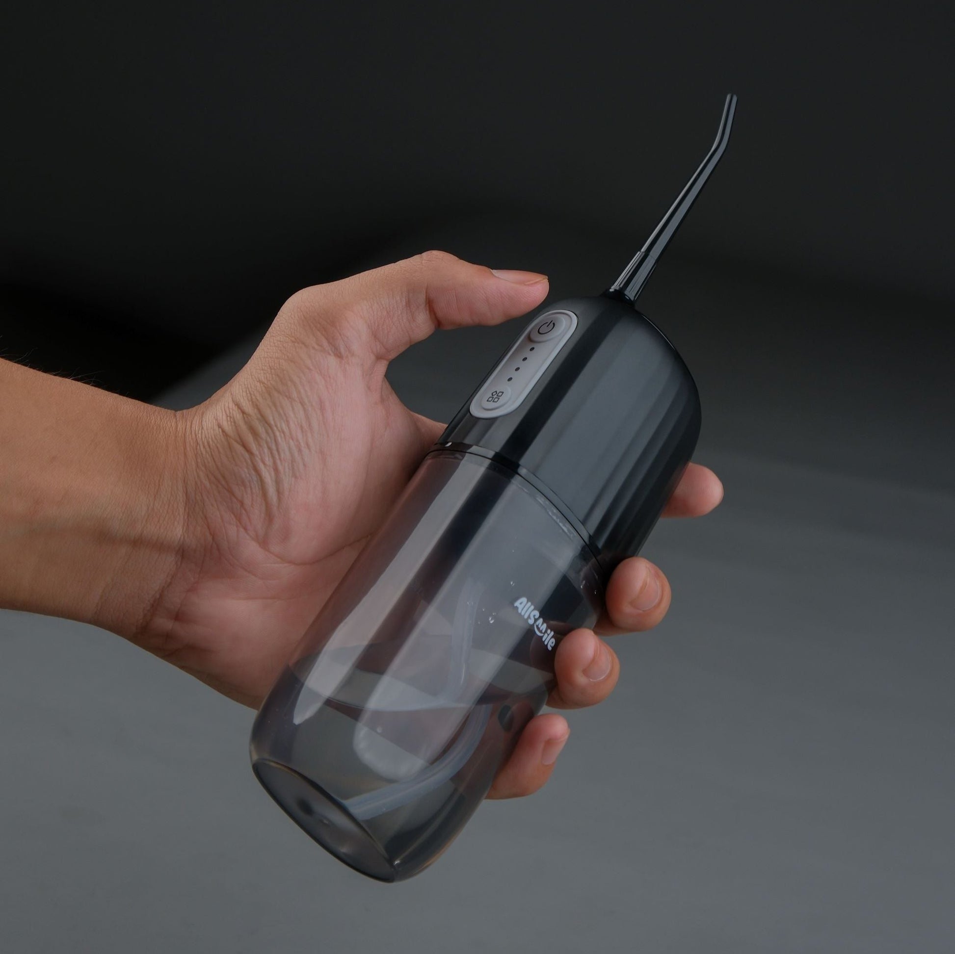 Using Allsmile Water Flosser for gentle and effective teeth cleaning, portable and easy oral care at home.