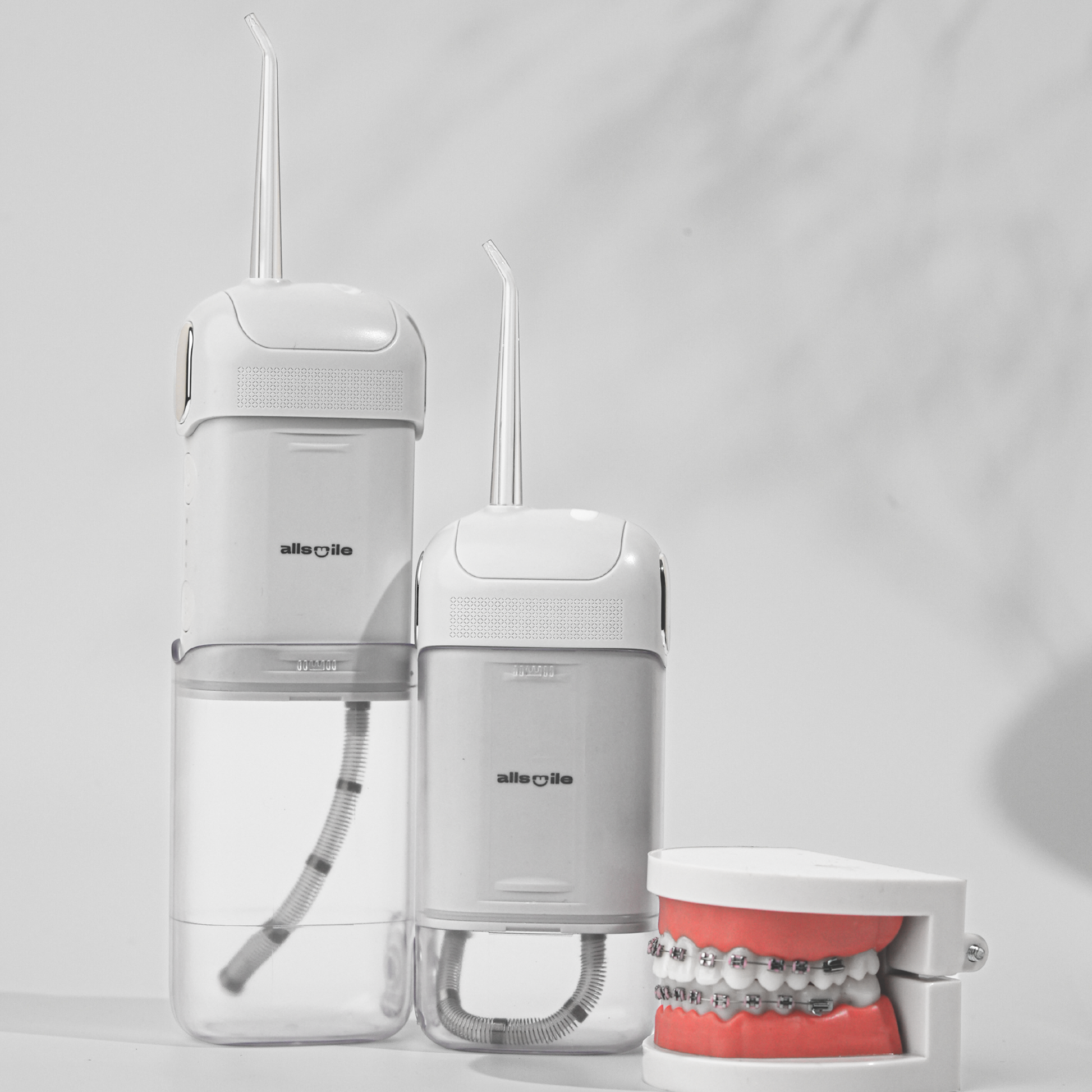 Allsmile water flosser have Adjustable and gum friendly pressure modes (60-140 psi) and nozzles dedicated for people with braces which is approved by dentist.